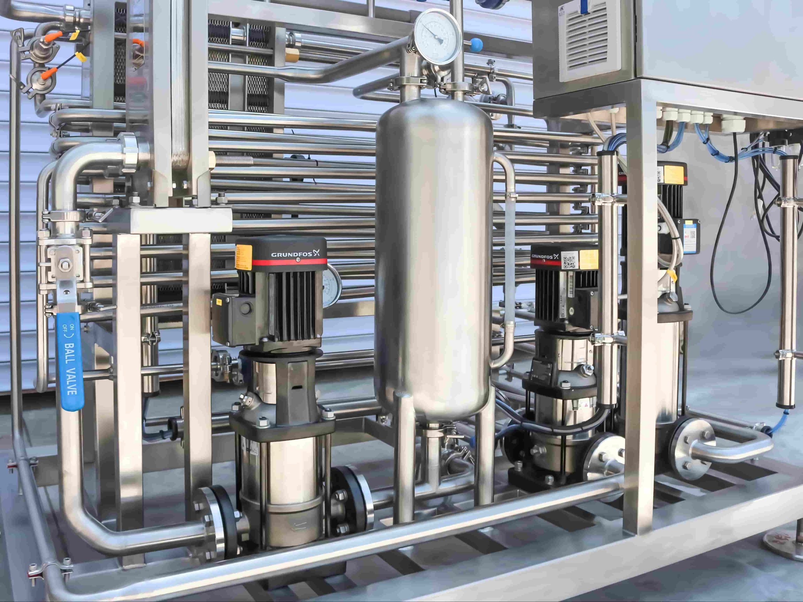 Compact flash pasteurizer with holding tube and control panel