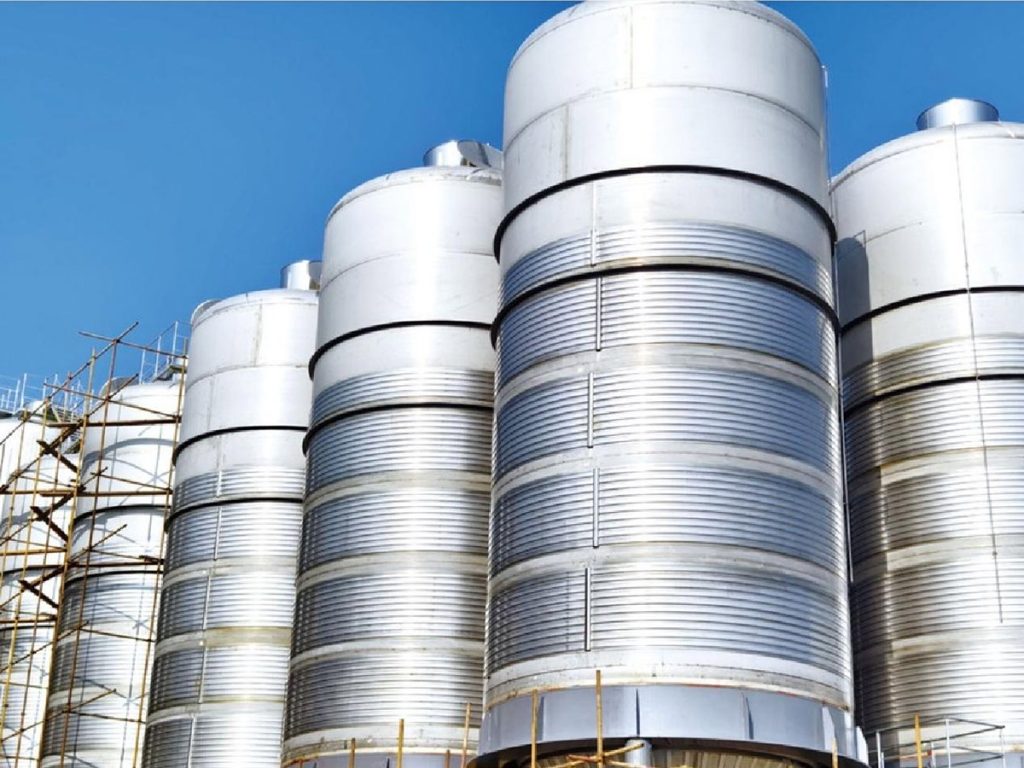 Stainless steel beer fermentation tank under construction at a brewery equipment factory